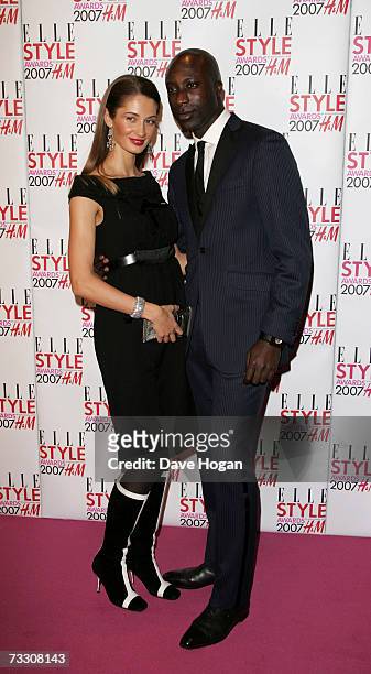 Designer Ozwald Boateng and his wife Gyunel arrive at ELLE Style Awards at the Roundhouse Theatre on February 12, 2007 in London, England.