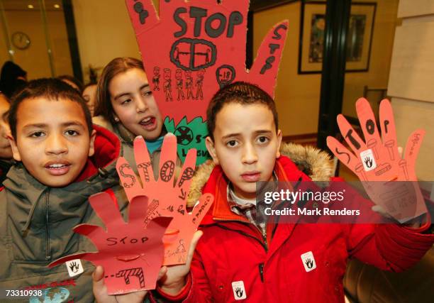 School children support operation Red Hand Day, at the Belgian Ministry of Foreign Affairs, on February 13, 2007 in Brussels, Belgium. Red Hand Day...