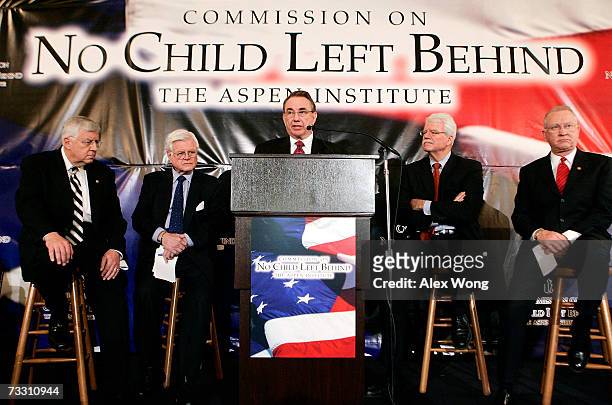 Co-chair of the No Child Left Behind Commission Tommy Thompson speaks as U.S. Sen. Mike Enzi , Sen. Edward Kennedy , Rep. George Miller , and Rep....