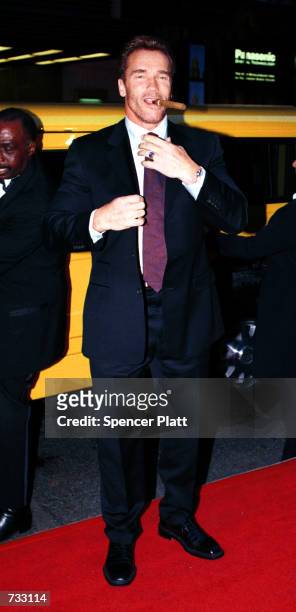 Actor Arnold Schwarzenegger enters Christie's Auction House October 23, 2000 for the Audemars Piguet's Time to Give Celebrity Watch Auction for...