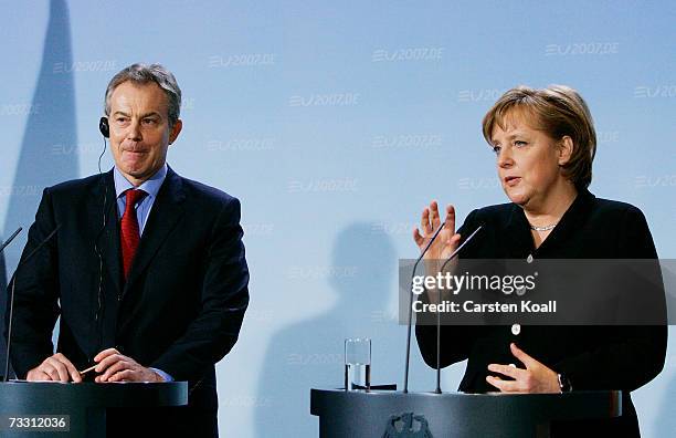 German Chancellor Angela Merkel and British Prime Minister Tony Blair speak at a news conference February 13, 2007 at the Chancellery in Berlin,...