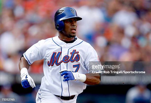 Jose Reyes of the New York Mets bats against the Los Angeles Dodgers during Game One of the National League Division Series at Shea Stadium on...