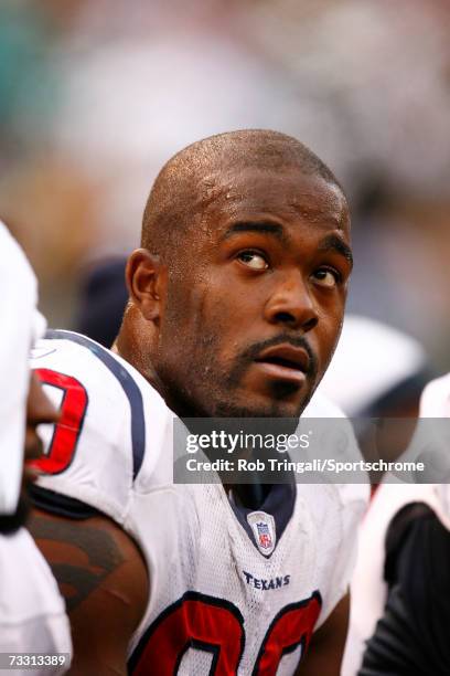 Defensive End Mario Williams of the Houston Texans looks on against the New York Jets at Giants Stadium on November 26, 2006 in East Rutherford, New...