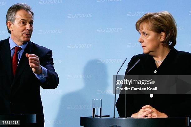 German Chancellor Angela Merkel and British Prime Minister Tony Blair speak at a news conference February 13, 2007 at the Chancellery in Berlin,...