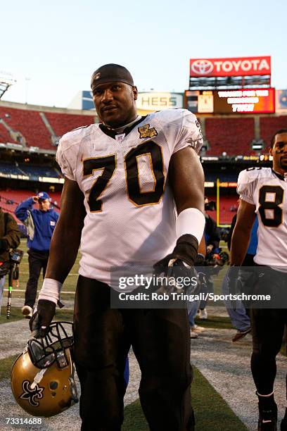 Offensive Lineman Jammal Brown of the New Orleans Saints walks off the field after a game against the New York Giants on December 24, 2006 at Giants...