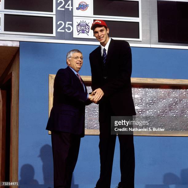 Pau Gasol shakes hands with NBA Commissioner David Stern after he was selected by the Atlanta Hawks during the 2001 NBA Draft at the Paramount...