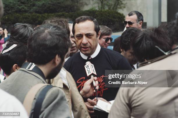 Governor of New York, Mario Cuomo, being interviewed by a radio reporter, New York City, May 1984.