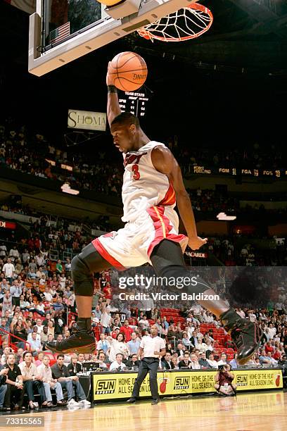 Dwyane Wade of the Miami Heat dunks against the Portland Trail Blazers on February 13, 2007 at American Airlines Arena in Miami, Florida. The heat...
