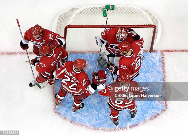 Carolina Hurricanes players celebrate after a win over the Los Angeles Kings on February 13, 2007 at the RBC Center in Raleigh, North Carolina. The...