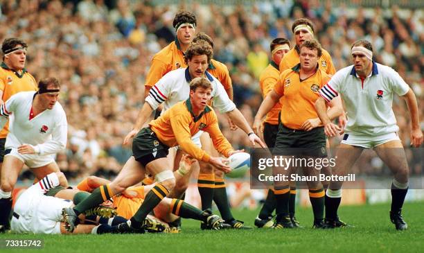 Nick Farr-Jones of the Wallabies offloads the ball during the Rugby World Cup final between England and Australia at Twickenham Stadium November 2,...