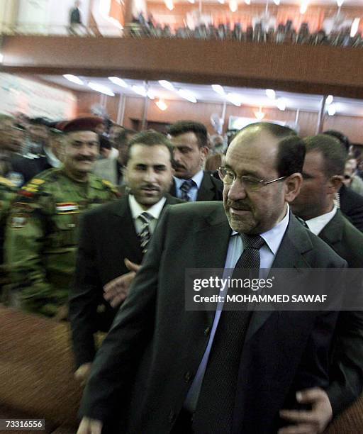 Iraqi Prime Minister Nuri al-Maliki attends a meeting with officials and leaders in the holy city of Karbala, central Iraq, 14 February 2007....