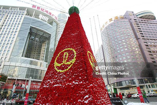 Giant rose tree is seen on a street on February 14, 2007 in Changchun of Jilin Province, China. Valentines Day is a traditional boon to flower...