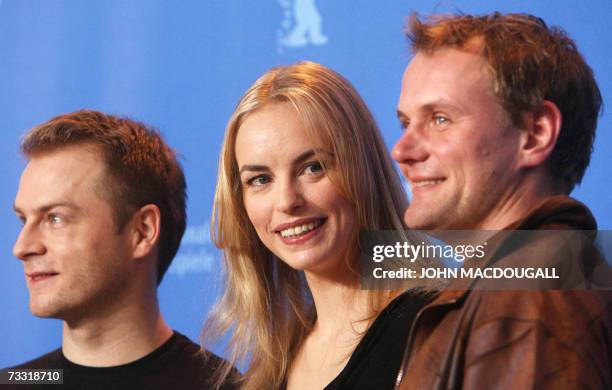 German actors Hinnerk Schoenemann, Nina Hoss and Devid Striesow pose during a photocall for their film "Yella" by German director Christian Petzold,...