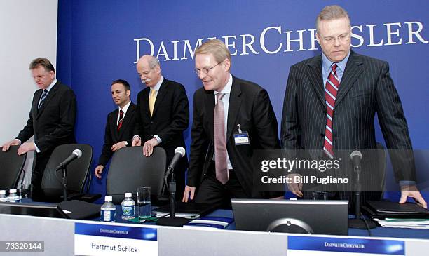 The DaimlerChrysler Board of Directors Andreas Renschler, Bodo Uebber, Dieter Zetsche, Hartman Schick, and Tom LaSorda hold a press conference at...