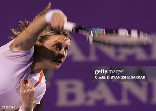 Slovakian tennis player Martina Sucha serves against her Indian opponent Sania Mirza during the first round match of the WTA Bangalore Open in...