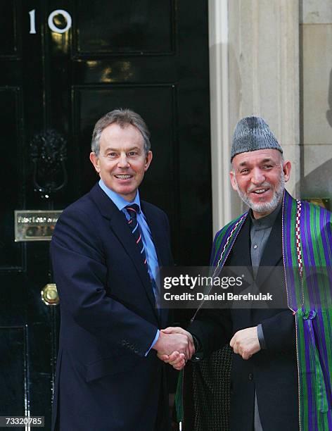 British Prime Minister Tony Blair meets with Afghanistan President Hamid Karzai outside his Downing St residence on February 14, 2007 in London,...