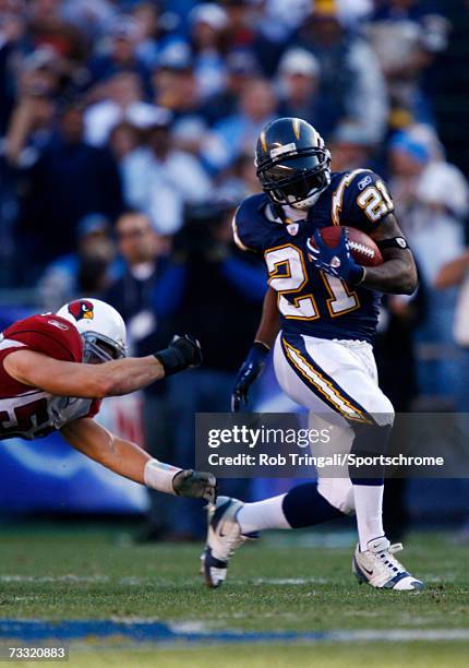 Running Back LaDainian Tomlinson of the San Diego Chargers rushes the ball against the Arizona Cardinals at Qualcomm Stadium on December 31, 2006 in...