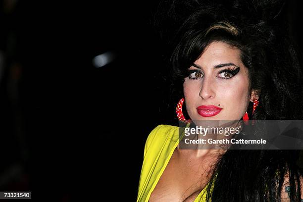 Singer Amy Winehouse arrives at the BRIT Awards 2007 in association with MasterCard at Earls Court on February 14, 2007 in London.