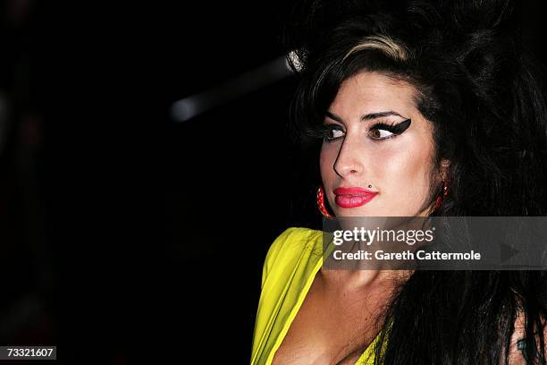 Singer Amy Winehouse arrives at the BRIT Awards 2007 in association with MasterCard at Earls Court on February 14, 2007 in London.