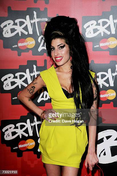 Singer Amy Winehouse arrives at The BRIT Awards 2007 in association with MasterCard at Earls Court 1 on February 14, 2007 in London, England.