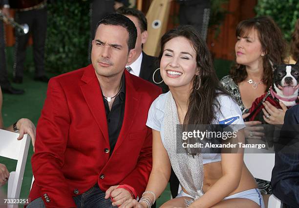 Carlos Calderon and Monica Franco aka "La Cartera" appear at the dog wedding of Cosita and Pucci on Univision's Despierta America on February 14,...