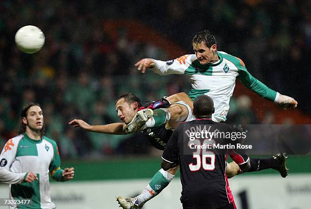 Miroslav Klose of Bremen heads at goal during the UEFA Cup Round of 32 match between Werder Bremen and Ajax Amsterdam at the Weser stadium on...