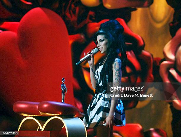 Singer Amy Winehouse accepts the Best British Female Award on stage during the show at the BRIT Awards 2007 in association with MasterCard, at Earls...