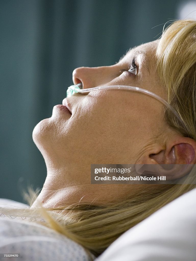 Profile of woman in hospital with respirator