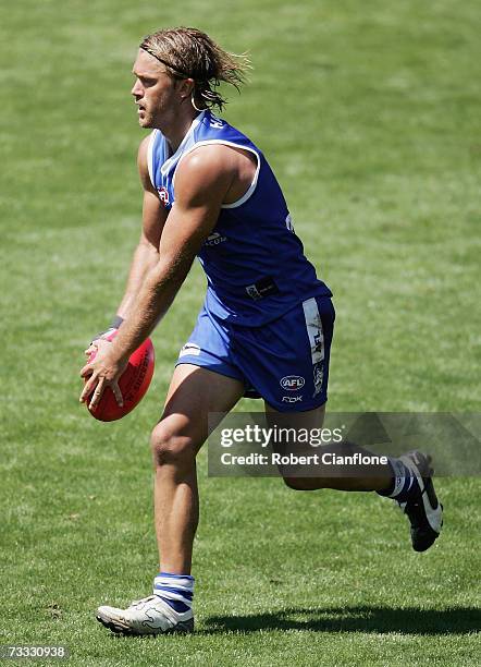 Jess Sinclair of the Kangaroos prepares to kick during the Kangaroos Intra-Club AFL match at MC Labour Park on February 15, 2007 in Melbourne,...