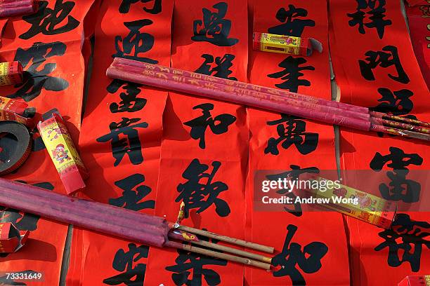 Chinese vendor sells traditional couplets and incense for Chinese New Year on February 15, 2007 at a market in Beijing, China. The Chinese lunar New...