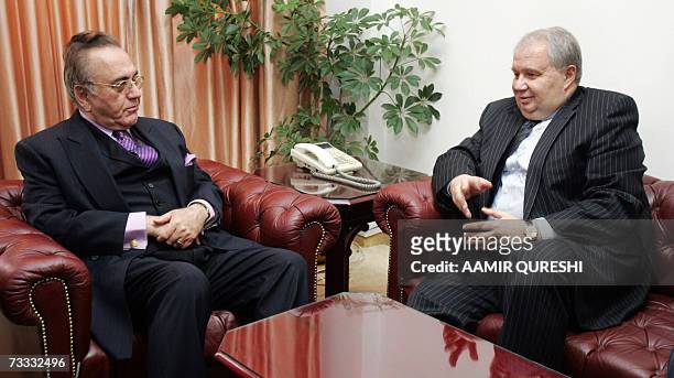 Pakistani Foreign Minister Khurshid Kasuri listens to Russian Deputy Foreign Minister Sergey Kislyak during a meeting in Islamabad, 15 February 2007....