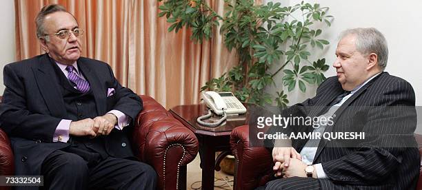 Pakistani Foreign Minister Khurshid Kasuri talks with Russian Deputy Foreign Minister Sergey Kislyak during a meeting in Islamabad, 15 February 2007....