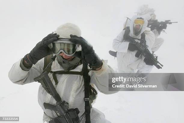 An Israeli army alpine unit returns after a patrol close to the Syrian border on the snow-covered slopes of Mt. Hermon February 15, 2007 on the...