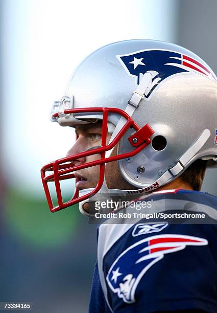 Quarterback Tom Brady of the New England Patriots looks on against the New York Jets in the AFC Wild Card Playoff Game at Gillette Stadium on January...