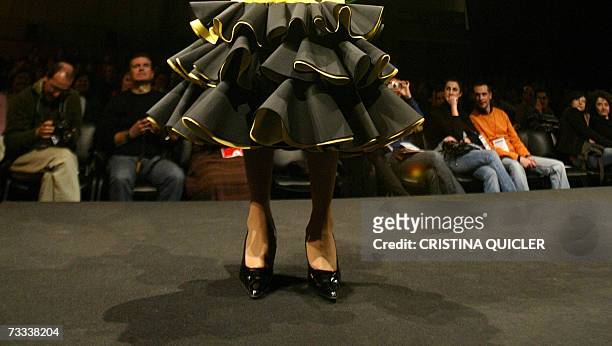 Transexual model wears a creation by Spanish designer Paco Prieto during the Simof 'Salon International of Flamenco Fashion' show at the conference...