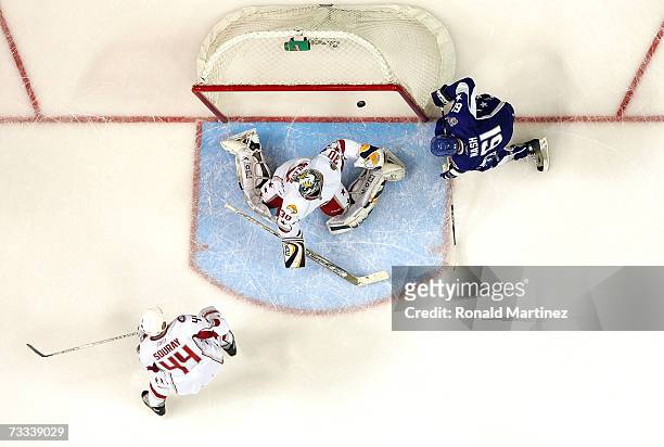 Western Conference All-Star Rick Nash of the Columbus Blue Jackets drives to the net on a goal by teammate Lubomir Visnovsky of the Los Angeles Kings...