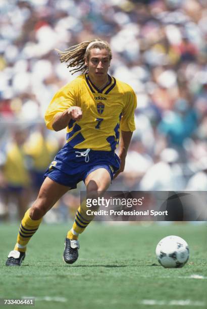 Swedish footballer Henrik Larsson pictured in action playing for Sweden in the 1994 FIFA World Cup knockout stage in July 1994. Sweden would lose to...