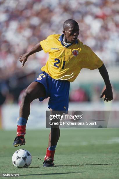 Colombian footballer Faustino Asprilla pictured in action playing for Colombia in the 1994 FIFA World Cup group A match between United States and...