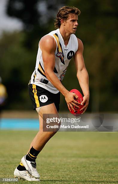 Brett Deledio of Team King kicks for goal during the Richmond Tigers intra-club AFL match at Casey Fields on February 16, 2007 in Melbourne,...