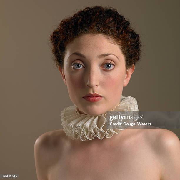 young woman wearing frilly collar, portrait - elizabethan collar stock pictures, royalty-free photos & images