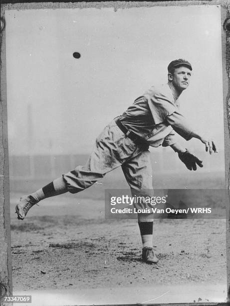 Christy Mathewson, New York Giants takes his warm up throws. Louis Van Oeyen traveled to New York on a number of occasions to photograph Mathewson.