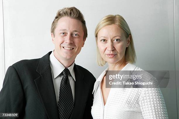 mature couple of business people standing together, portrait - business mature couple portrait bildbanksfoton och bilder