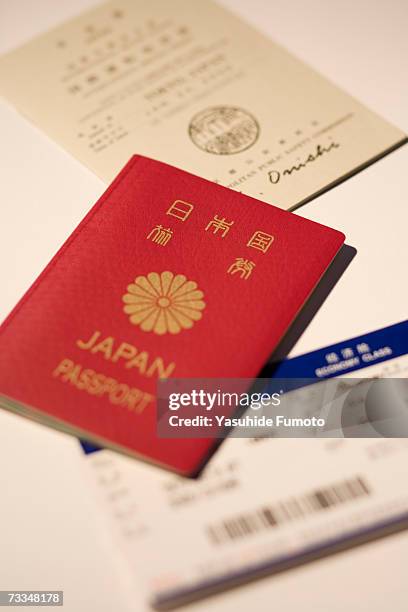 japanese passport,driving licence and air ticket, close-up - écriture japonaise photos et images de collection