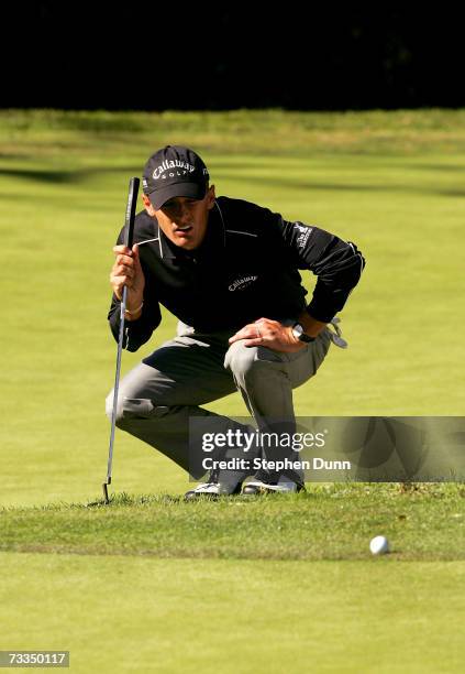 Charles Howell III lines up his putt from the fringe of the center green bunker on the sixth hole during the second round of the Nissan Open on...