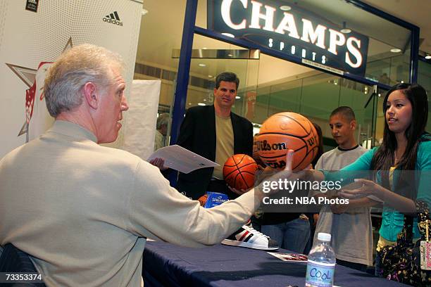 Former NBA star Bill Walton signs autographs and greets customers at the Champs Sporting Goods store during NBA All-Star Week festivities at the Las...