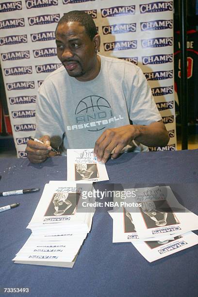 Former NBA star Micheal Ray Richardson signs autographs and greets customers at the Champs Sporting Goods store during NBA All-Star Week festivities...