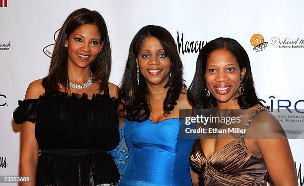 Event chair Tracy Mourning, Behind the Bench founder Deborah Williams, and president Charrisse Jordan arrive to the Behind the Bench's Annual...