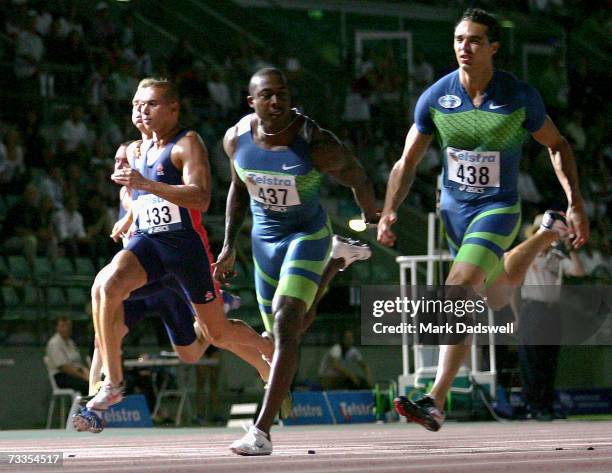 Patrick Johnson of the AIS and Joshua Ross of the NSWIS are defeated by Shawn Crawford of USA in the Men's 100 Metres race during the 2007 Telstra...