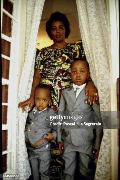 The Prime Minister of Rwanda Agathe Uwilingiyimana with two of these five children, Aimé-Michel and Charles-Théophile.