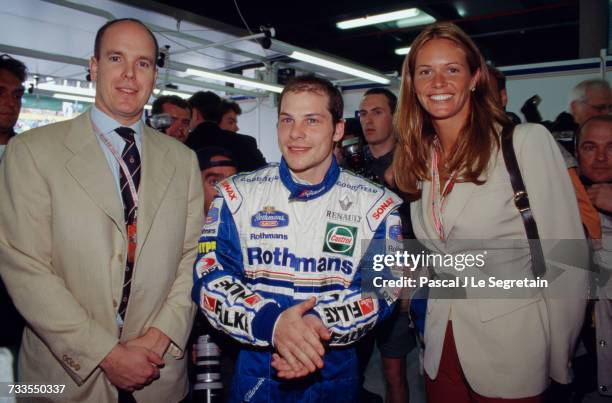 Albert, Crown Prince of Monaco, and Australian fashion model Elle MacPherson meet Canadian Formula One driver Jacques Villeneuve at the 1997...